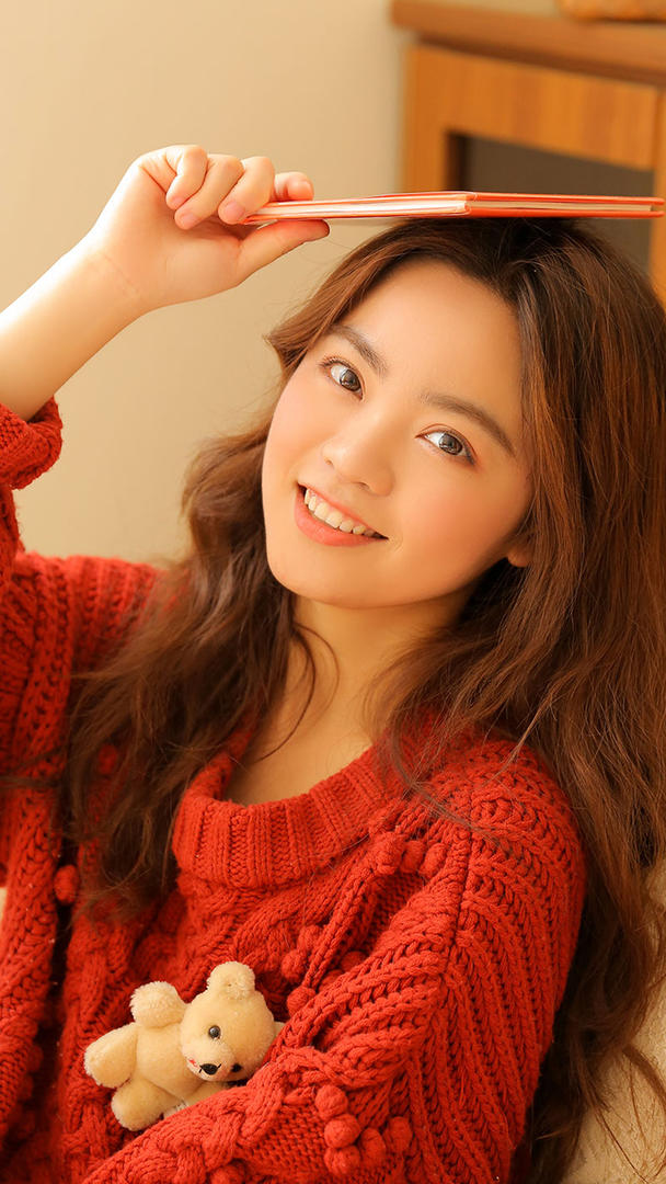 头上顶着书本的可爱女生头像图片