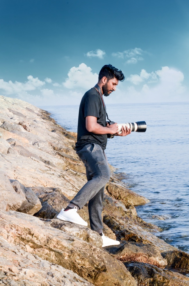 海边摄影师帅哥图片