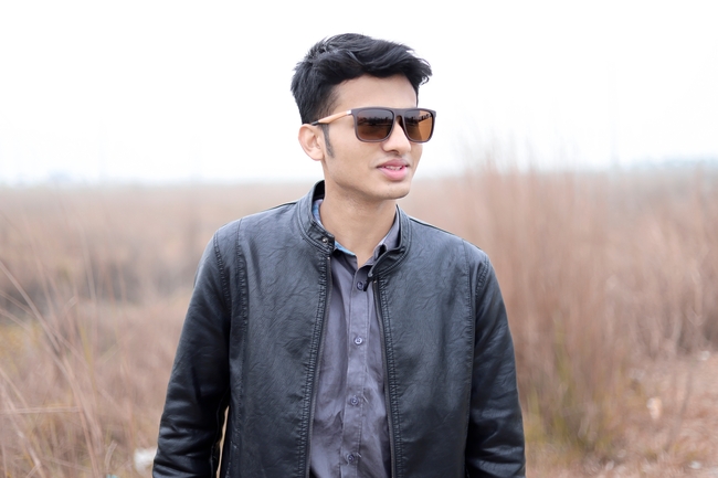 秋天户外戴墨镜帅哥写真图片