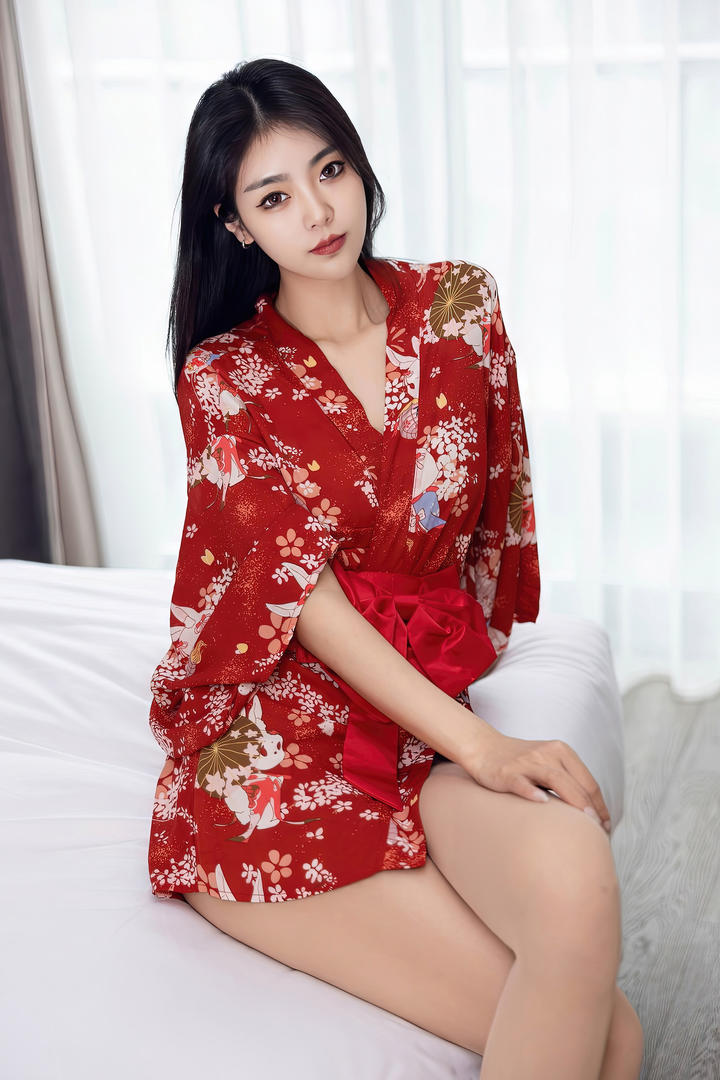 坐在床上的高颜值美女专区素材图片